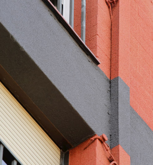 Fassadenschutz mit KliuCork® Deutschland Sprühkork – nachhaltige Korkbeschichtung als langlebige Korkfarbe für Außenwände.