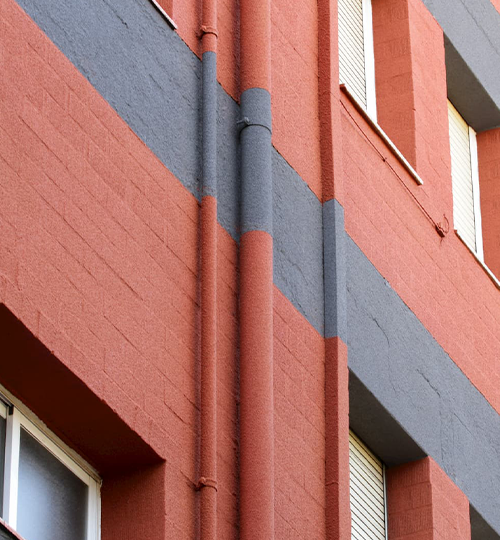 Fassadenschutz mit KliuCork® Deutschland Sprühkork – nachhaltige Korkbeschichtung als langlebige Korkfarbe für Außenwände.